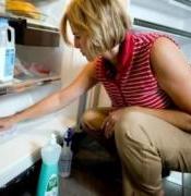 Cleaning refrigerator surfaces