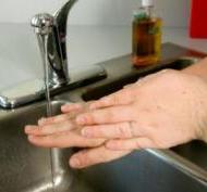 Hand washing under running water
