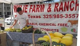Farmers market sign advertising chemical-free produce