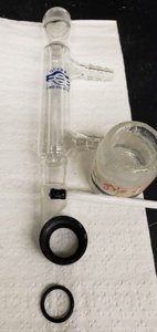 Greasing and assembling reflux condenser