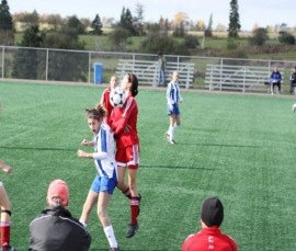 Adolescents with sports equipment