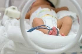 Preterm infant in incubator