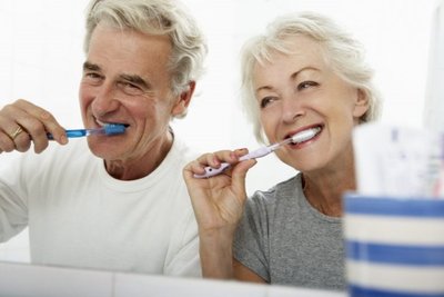 Older adults brushing teeth