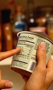 Older adult reading nutrition label