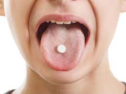 Tablet placed on tongue for oral administration