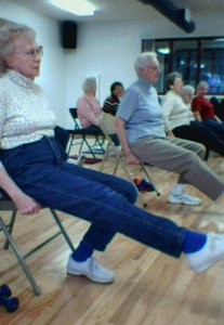 Older adults participating in chair exercises