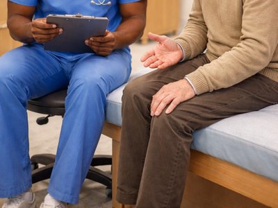 Nurse and patient in a clinical setting