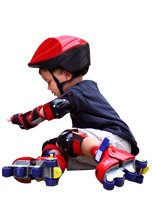 Child wearing helmet and protective gear