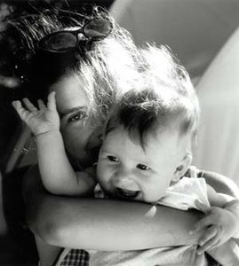 Hands holding a plant, symbolizing growth and empowerment