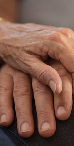 Hands of older adult, symbolizing aging and experience