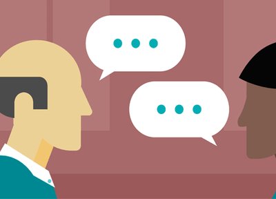 Two people communicating with speech bubbles