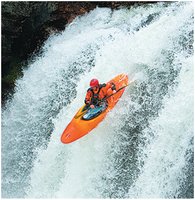 Kayaker going over a waterfall
