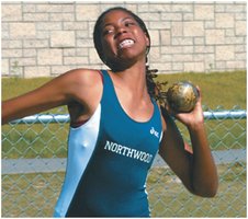 Athlete preparing to throw a shot put, illustrating force application