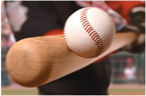 Baseball bat hitting a ball, illustrating contact force