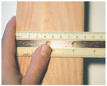 Measuring a board with a ruler