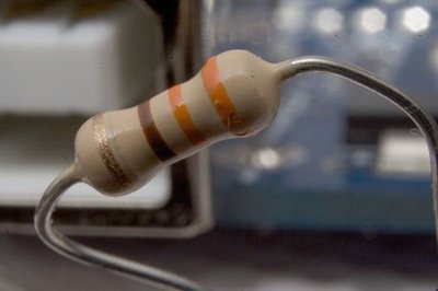 Close-up of a resistor with color bands