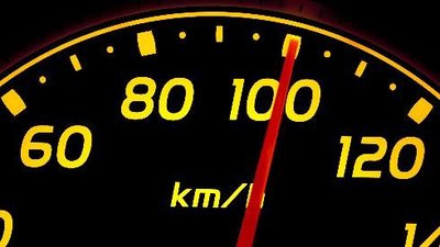 Car speedometer showing speed