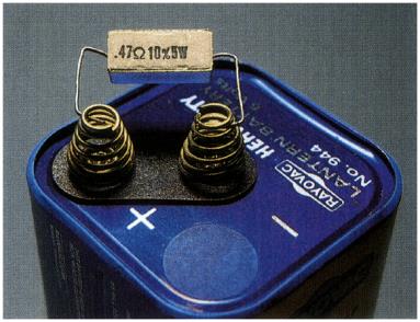 Battery with resistor connected