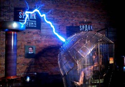 Person inside a Faraday cage being struck by lightning