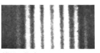 Single electron double slit experiment: build-up of interference pattern