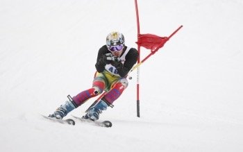 Skier pushing against snow