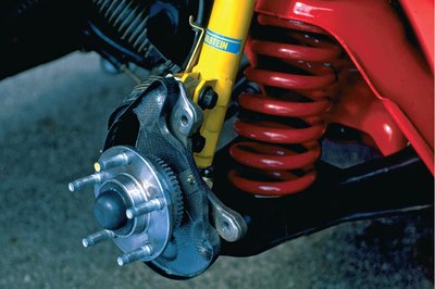 Automobile suspension system with spring and damper