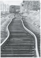 Buckled railroad tracks due to thermal expansion