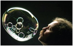 Bubbles forming spheres due to surface tension