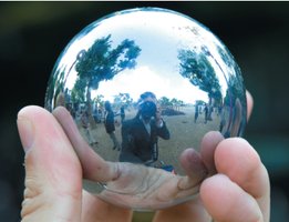 Diverging mirror forms upright, reduced image