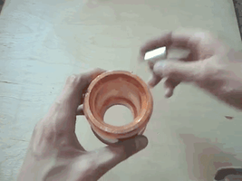 Eddy currents demonstration with falling magnet in copper tube