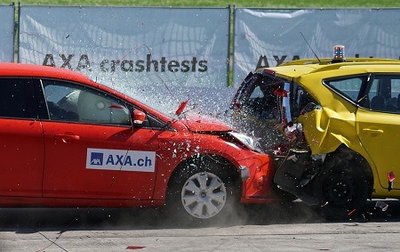 Car crash illustrating momentum conservation