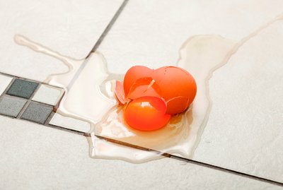 Broken egg on the floor illustrating deceleration