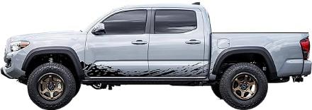 Truck being lifted by hydraulic lift