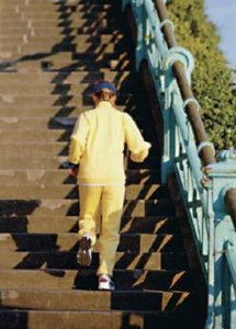 Jogger running up stairs