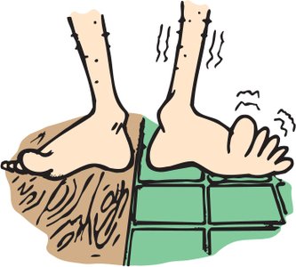 Feet on wood and tile illustrating conduction and insulation