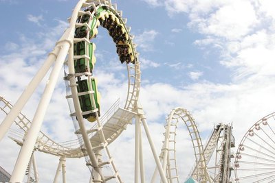 Roller coaster on a curved track illustrating motion in two dimensions