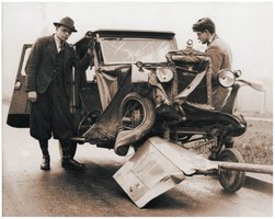 Car crash, illustrating inelastic collision and energy absorption.