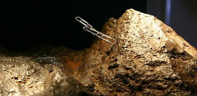 Lodestone attracting paperclips