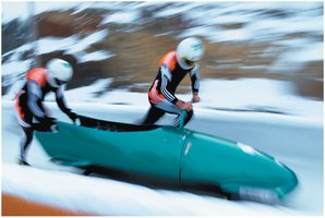 Bobsled being pushed, illustrating force and acceleration