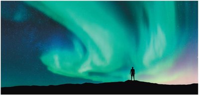Aurora caused by charged particles in Earth's magnetic field