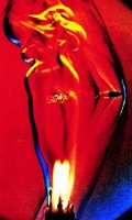 Bullet in flame showing shock wave