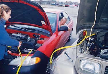 Jump starting a car with jumper cables