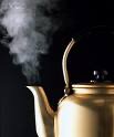Steam coming out of a kettle, representing water vapor phase