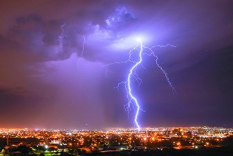 Lightning striking a city