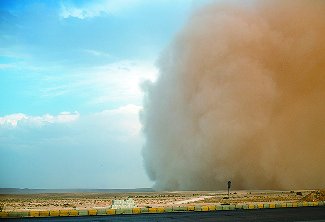 Electrified dust cloud in a sandstorm