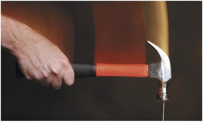 Hammer and nail illustrating action-reaction forces