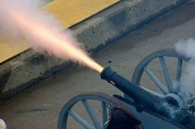 Cannon firing a projectile