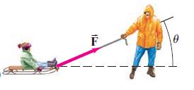 Man pulling sled at an angle