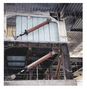 Shock absorbers in a building for damping