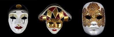 Three theatrical masks representing the concept of persona